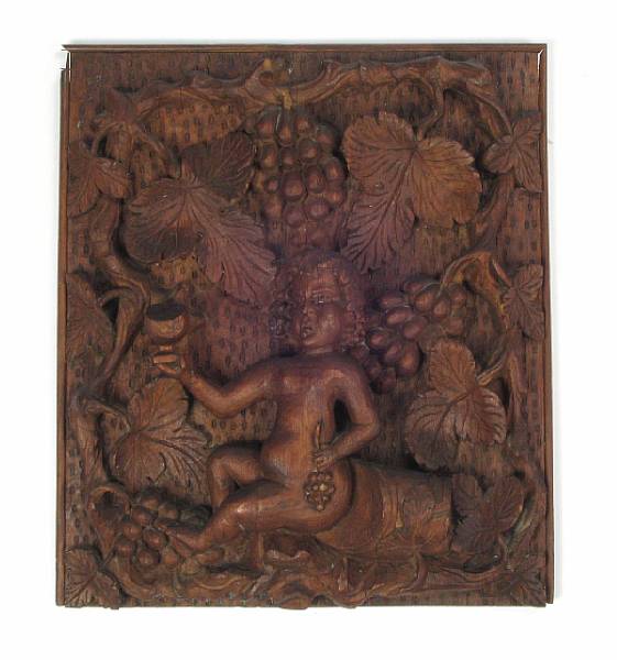 Appraisal: A carved wood relief panel of Bacchus height in width