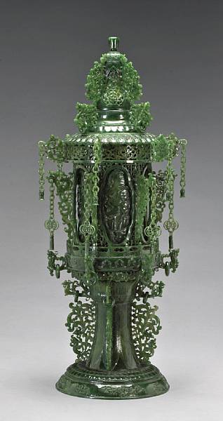 Appraisal: A large 'spinach' jade tiered censer th Century Assembled from