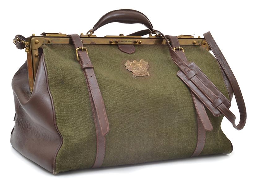 Appraisal: A GENTLEMAN'S TRAVEL BAG BY PRIZMIC BRILL IN CANVAS AND