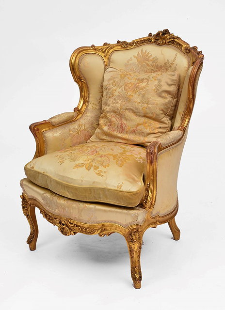 Appraisal: A FRENCH GILTWOOD FRAME ARMCHAIR with scrolling cresting rail serpentine