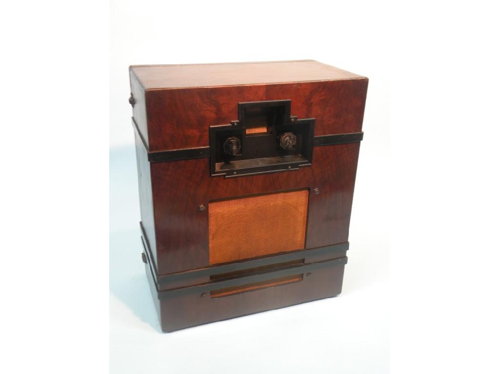 Appraisal: An Art Deco style radio in a figured walnut case