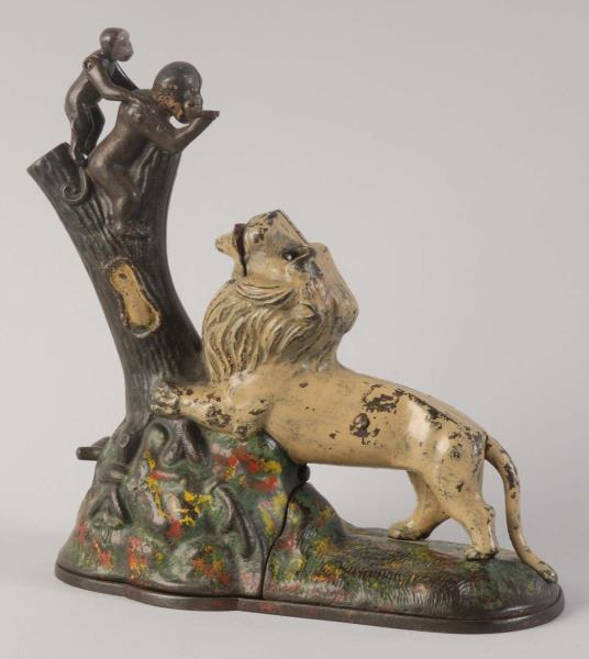 Appraisal: Lion and Two Monkeys Mechanical Bank Manufactured by Kyser and