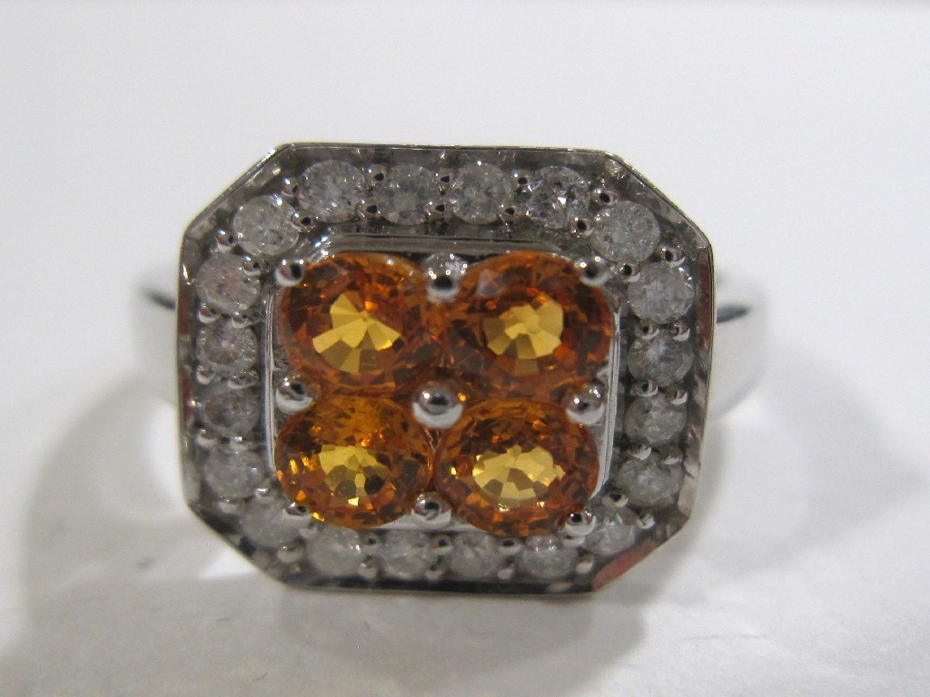 Appraisal: Nine carat white gold citrine and diamond cluster ring with