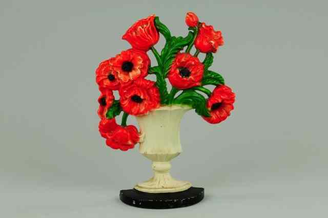 Appraisal: POPPIES DOORSTOP Hubley '' '' vibrant colors beautifully arranged casting