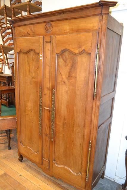 Appraisal: AN EARLY TH CENTURY WALNUT TWO DOOR WARDROBE WITH BRASS