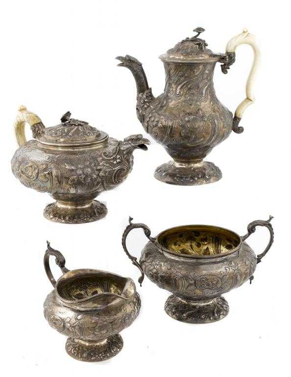 Appraisal: A GEORGE IV TEA AND COFFEE SERVICE with eagle's heads