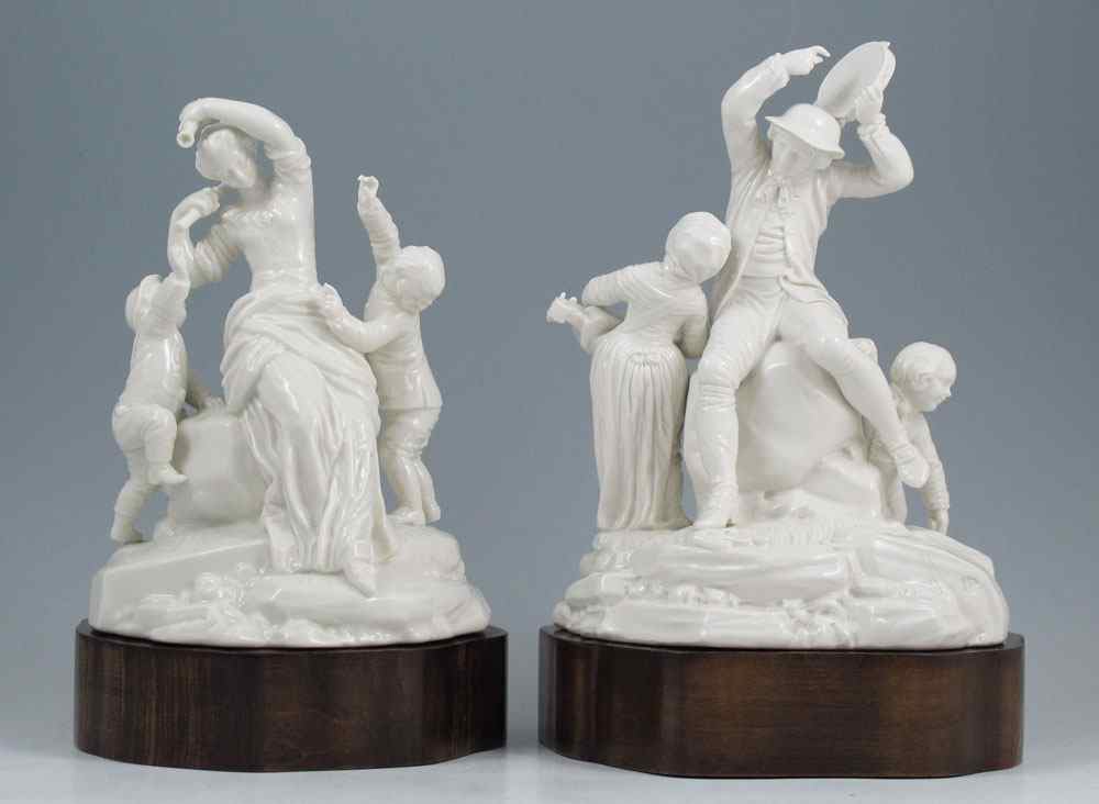 Appraisal: PAIR NYMPENBURG BLANC DE CHINE PORCELAIN FIGURAL GROUPS Companion pieces