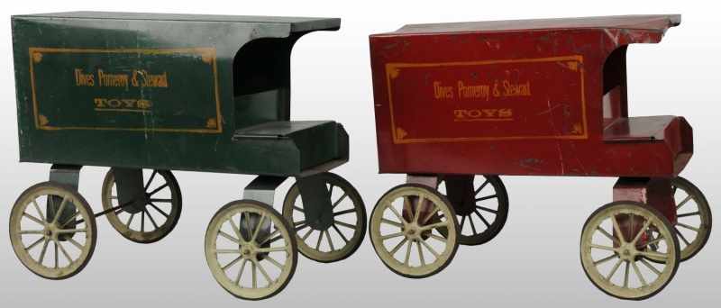 Appraisal: Lot of Tin Scheible's Delivery Wagon Toys Description Matching pair