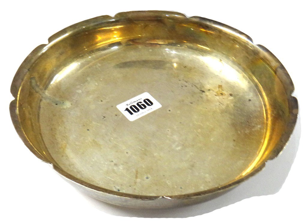 Appraisal: A silver shaped circular dish of shallow form diameter cm