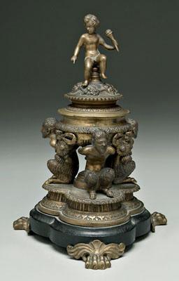 Appraisal: Bronze inkwell mounted on three squatting satyrs above conforming tripod