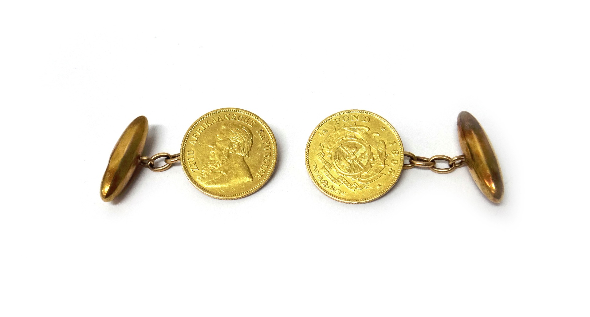 Appraisal: A pair of gold cufflinks the fronts formed from South