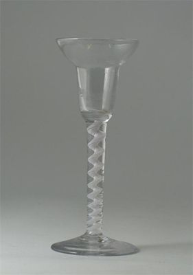 Appraisal: A pan-topped wine glass on an opaque corkscrew twist stem