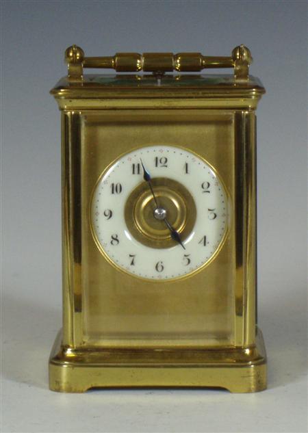 Appraisal: A brass cased repeater carriage clock with white enamel dial