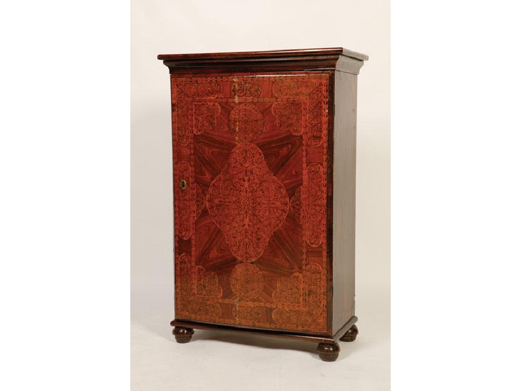 Appraisal: A WILLIAM AND MARY SEAWEED MARQUETRY SIDE CABINET with a