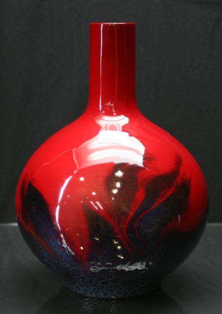 Appraisal: A Royal Doulton veined Flamb vase of bulbous teardrop form