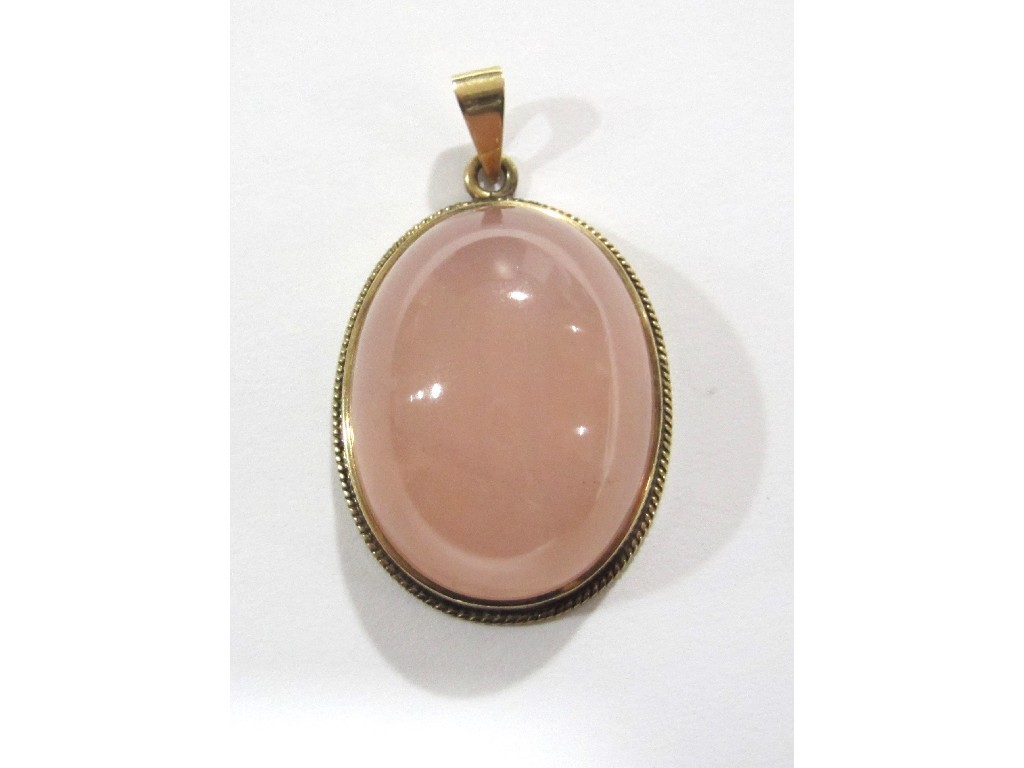 Appraisal: An Edwardian ct gold mounted rose quartz pendant with oval