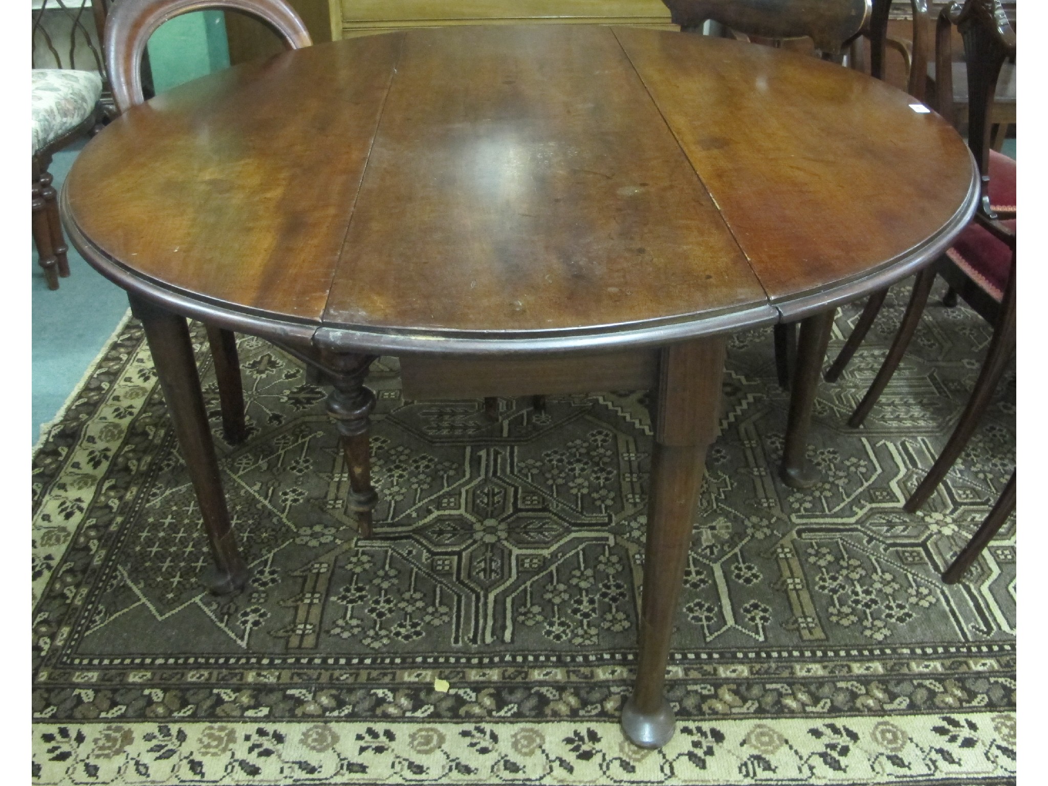 Appraisal: th Century mahogany drop leaf dining table possibly Irish