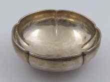 Appraisal: A deeply lobed Arts Crafts silver bowl with stiffened rim