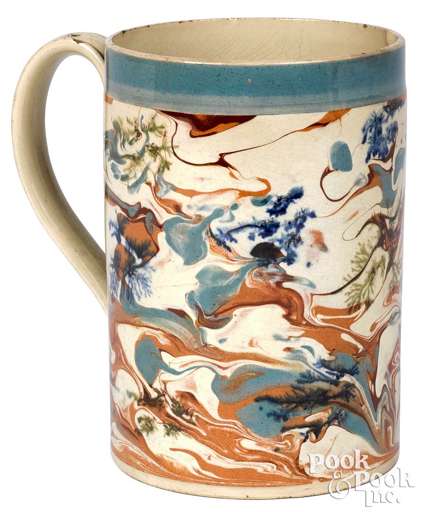 Appraisal: Mocha mug with marbleized glaze Mocha mug with marbleized glaze