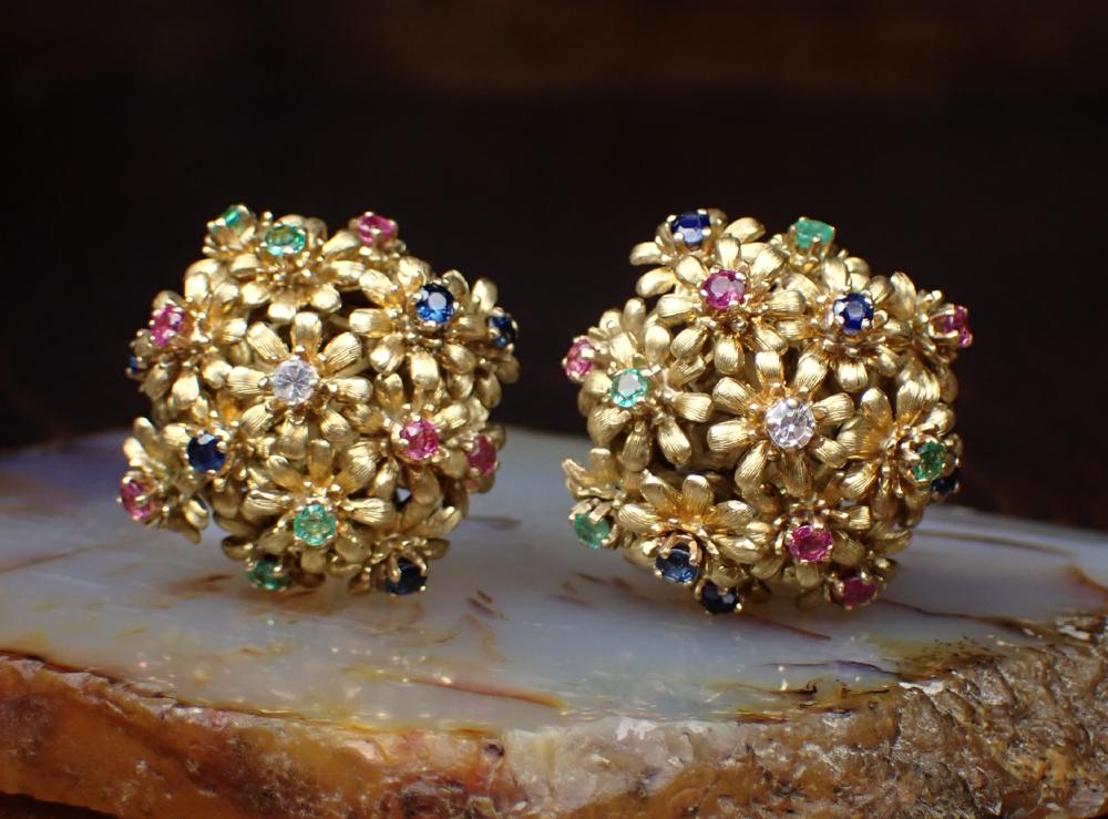 Appraisal: PAIR OF EIGHTEEN KARAT GOLD CLIP-ON EARRINGS Each earring with