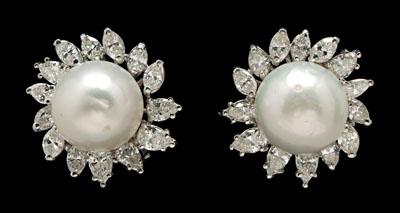 Appraisal: South sea pearl diamond earrings each set with mm white