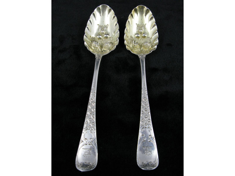 Appraisal: Pair of Sterling Fruit Spoons English ca having gold washed