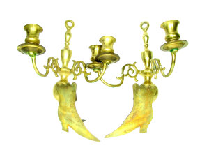 Appraisal: A pair of Dutch style twin branch brass wall candle