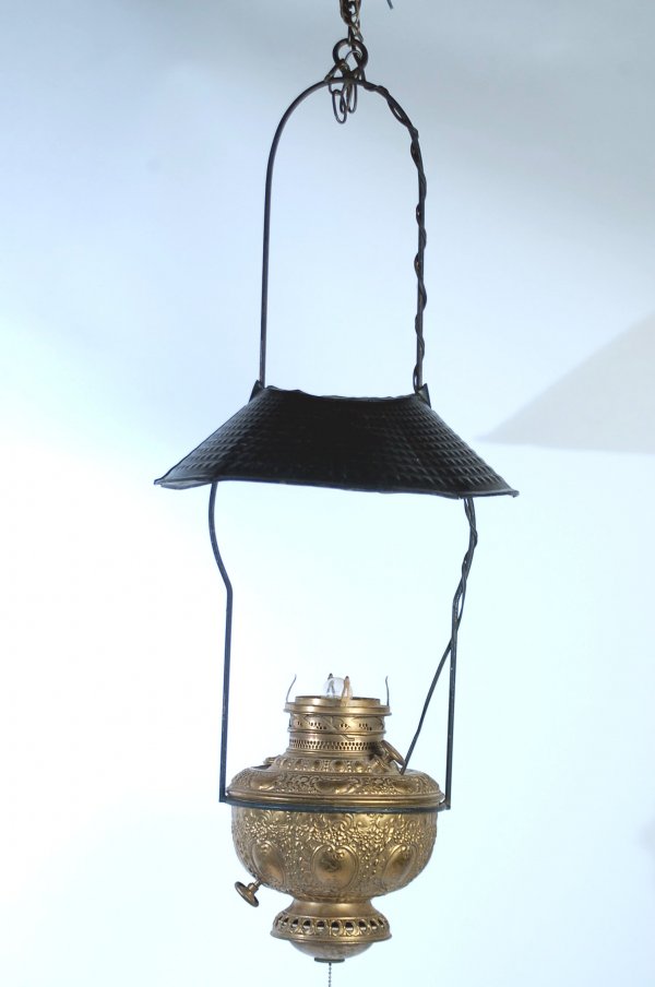 Appraisal: Late th century country store hanging kerosene lamp embossed brass