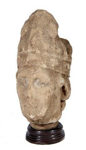 Appraisal: A MEDIEVAL CARVED LIMESTONE HEAD of a bishop with Mitre