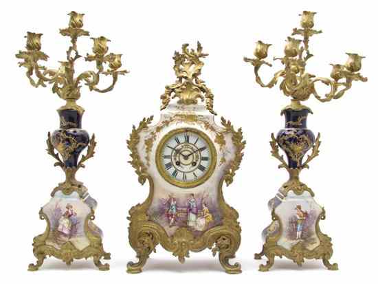 Appraisal: A Continental Porcelain and Gilt Bronze Mounted Clock Garniture the