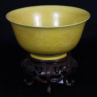 Appraisal: Chinese Sgraffito Yellow Bowl Dragon Chinese yellow sgraffito porcelain bowl