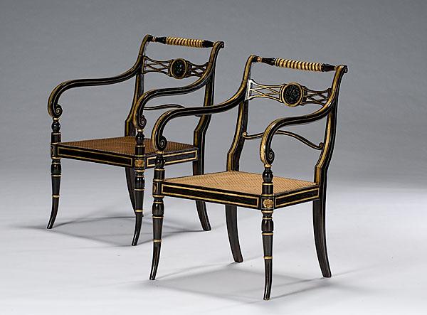 Appraisal: PAIR OF ENGLISH REGENCY ARMCHAIRS WITH LION'S MASK CRESTS ca