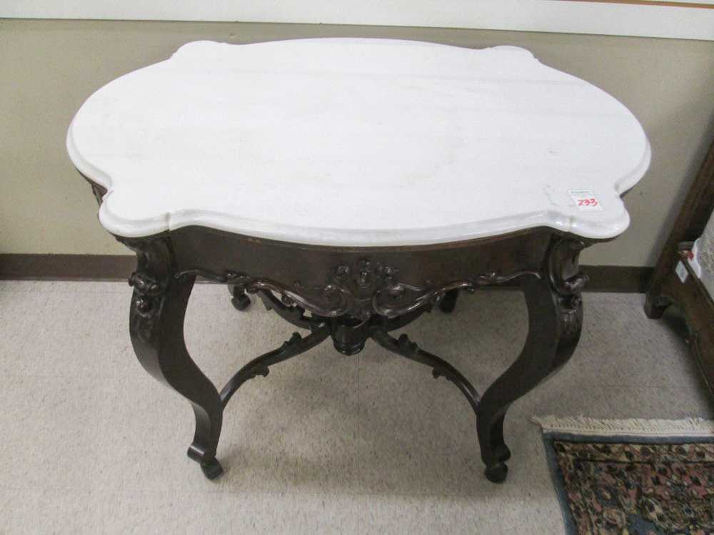 Appraisal: VICTORIAN MARBLE-TOP MAHOGANY CENTER TABLE American th century with conformingly