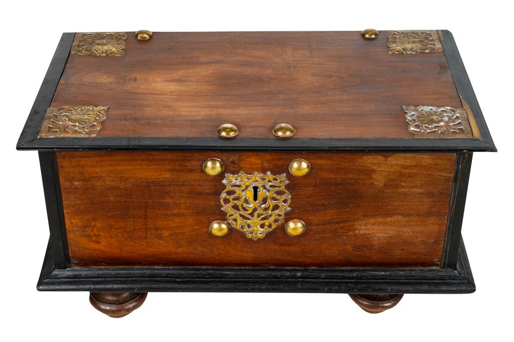 Appraisal: BRASS-MOUNTED MAHOGANY CHESTthe hinged top enclosing an interior with a