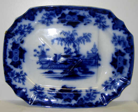 Appraisal: ENGLISH FLOW BLUE TREE AND WELL PLATTER Shaped octagonal Scinde