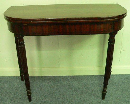 Appraisal: A Regency mahogany card table on reeded taper legs cm