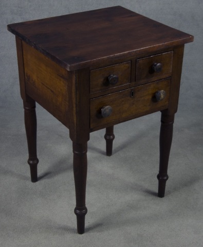 Appraisal: Cherry Three-Drawer StandHaving two-over-one dovetailed drawers Wooden pulls and single