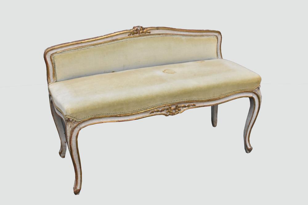 Appraisal: LOUIS XV STYLE PAINTED AND GILT WINDOW BENCHCirca The upholstered