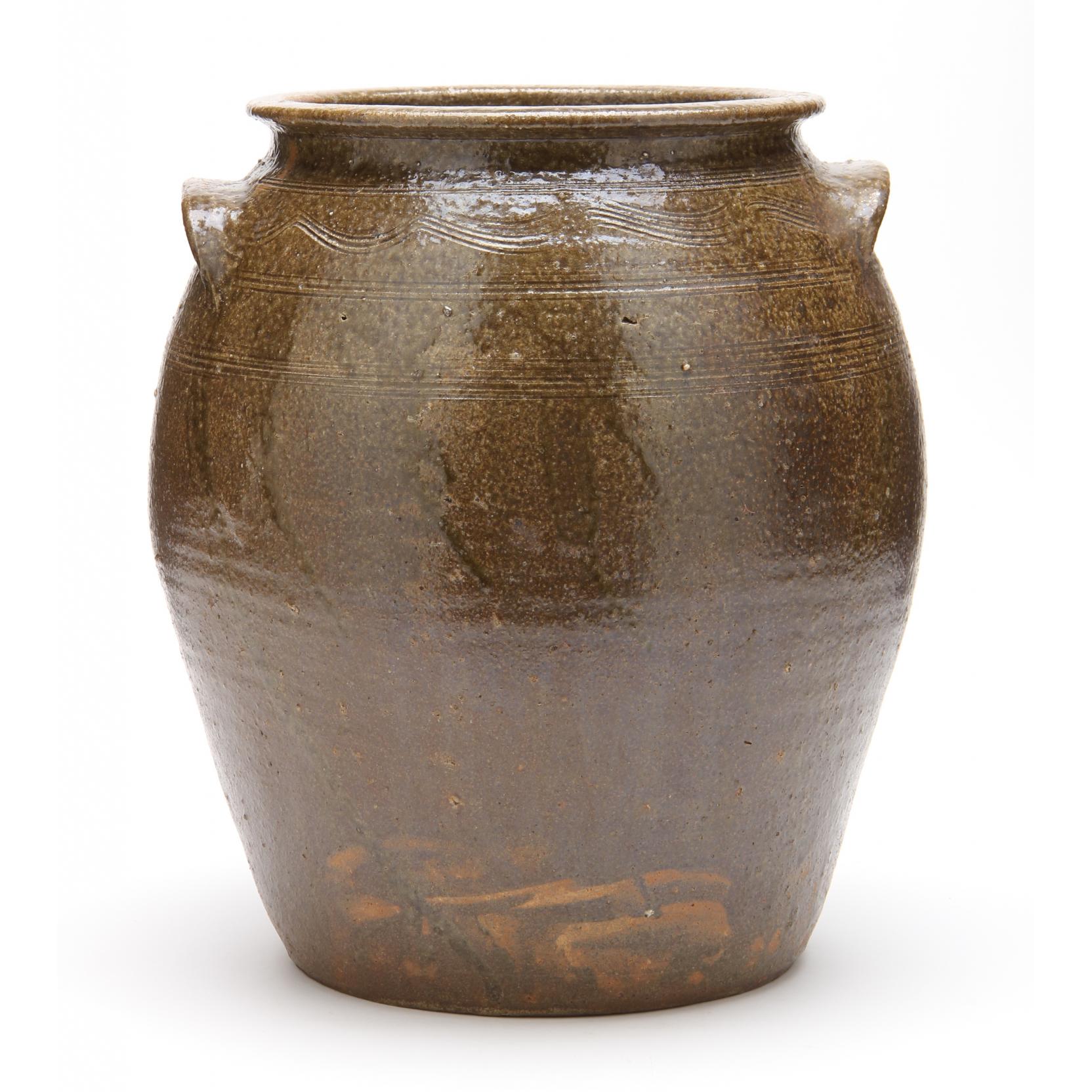 Appraisal: NC Pottery Three Gallon Storage Crock having a dark olive