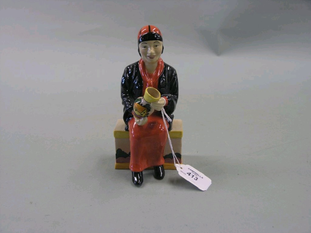 Appraisal: A Manor Limited Editions figure of Clarice Cliff seated with