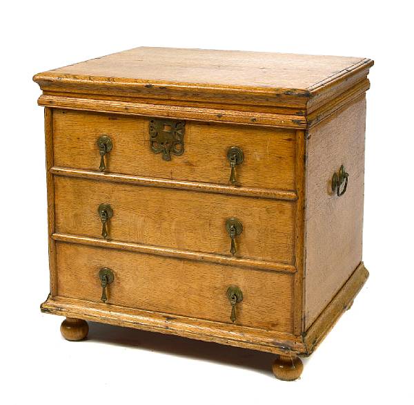 Appraisal: A storage canteen with three faux drawers height in width