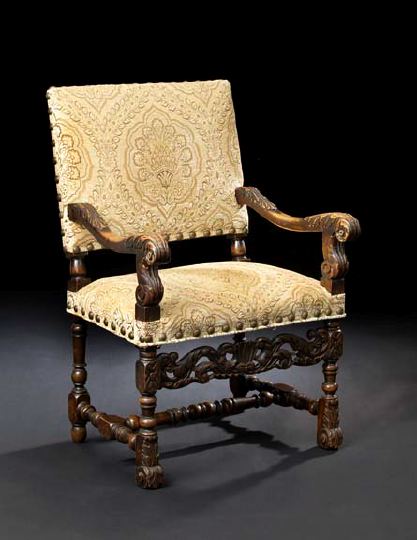 Appraisal: Louis XIII-Style Carved Walnut Fauteuil mid- th century the padded