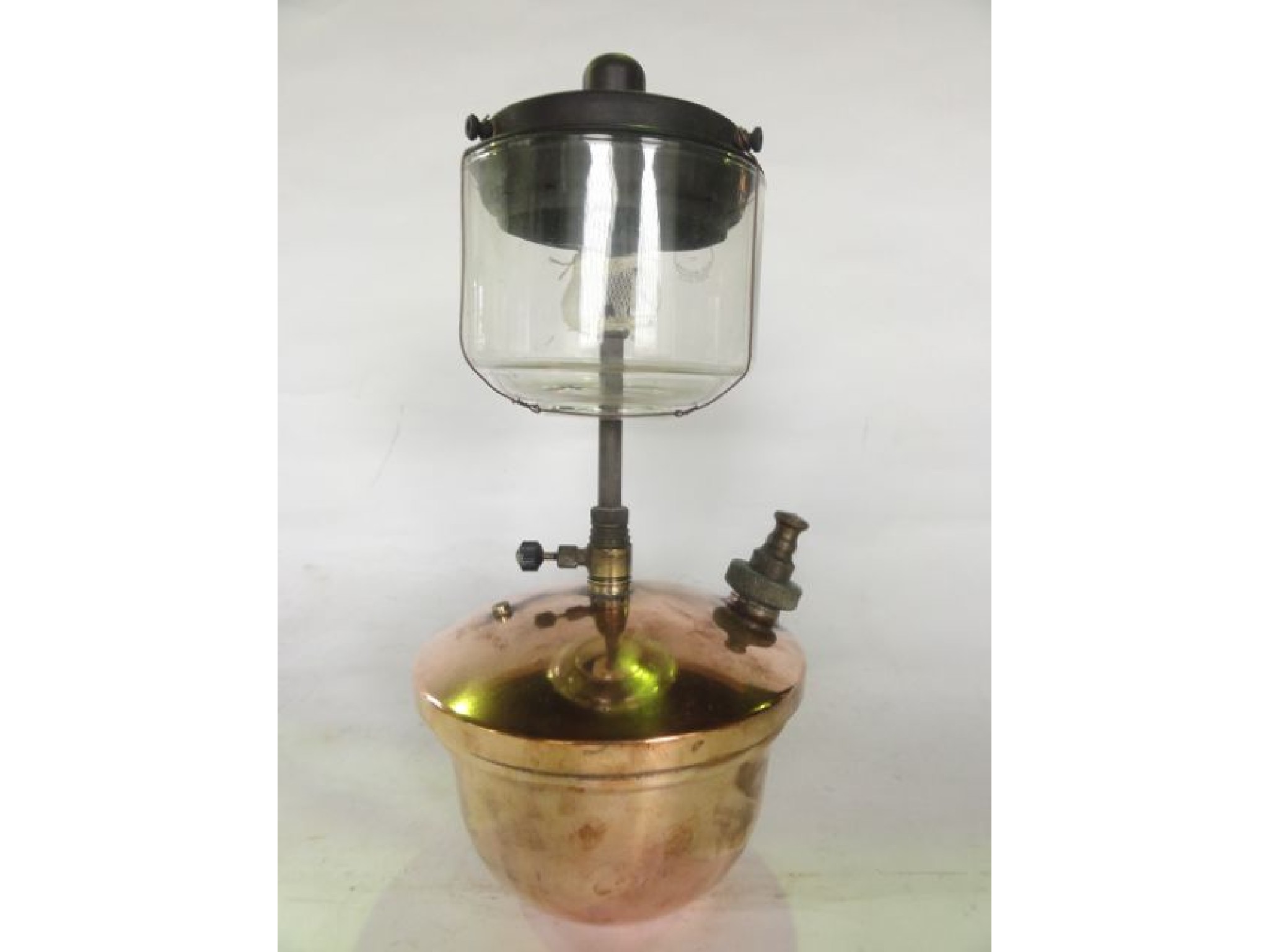 Appraisal: A Tilley lamp with copper fount base supporting a Pyrex