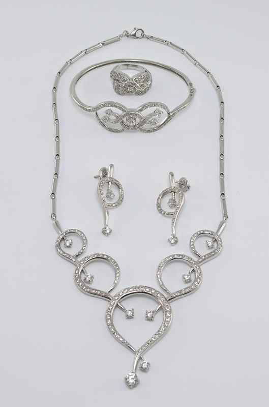 Appraisal: K JEWELRY ENSEMBLE K white gold necklace hinged bracelet earrings