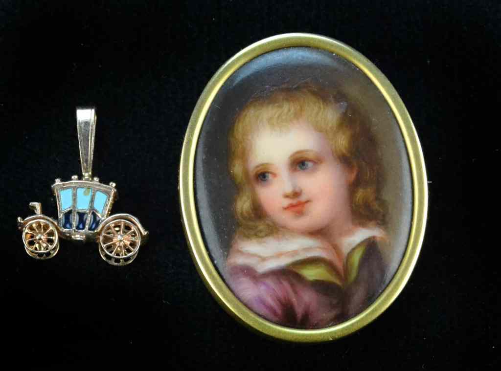 Appraisal: Porcelain Portrait Pendant and Coach CharmConsisting of oval painted portrait