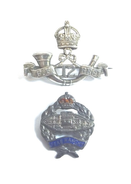 Appraisal: A silver Indian Army badge designed as a within a