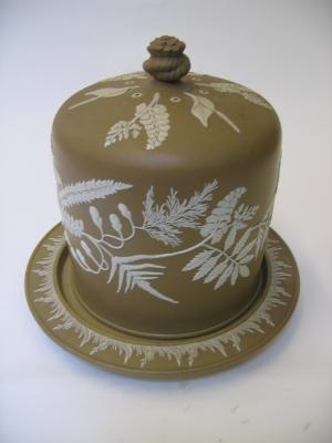 Appraisal: A VICTORIAN SMEAR GLAZED STONEWARE CHEESE DOME AND BASE of