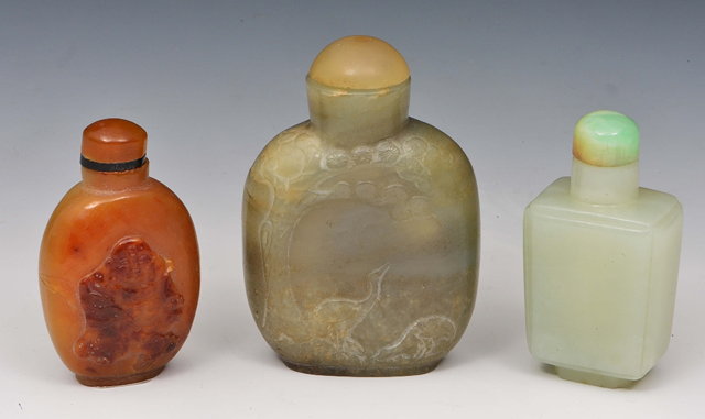 Appraisal: Three Chinese snuff bottles with stoppers th Centuryincluding rectangular mutton