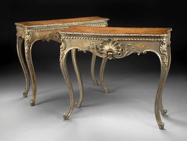 Appraisal: A pair of Rococo style carved silver gilt metamorphic console