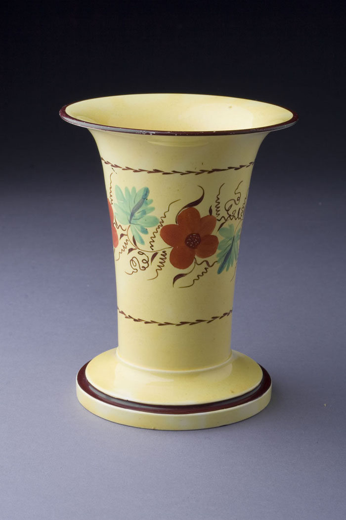 Appraisal: ENGLISH YELLOW GLAZED TRANSFER PRINTED SPILL VASE Decorated with floral